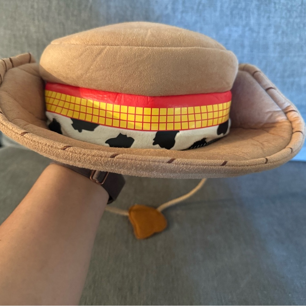 Cowboy Style Tan Hat with Red and Yellow Accents